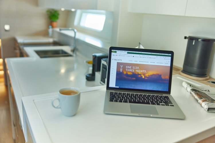 Y8 luxury carbon yacht Vegas Baby pantry with macbook